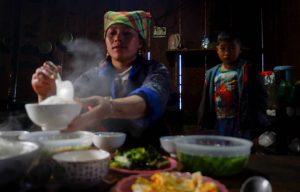 Hmong girl cooks lunch