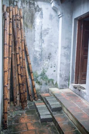 Hanoi street photography bamboo poles